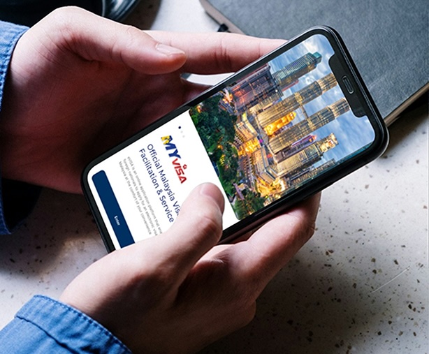 A professional-looking photo with a camera on a tripod, suggesting event coverage or documentation.